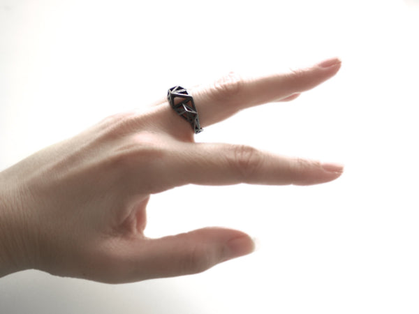 Slim Triangulated Ring in Dark Steel. 3d printed